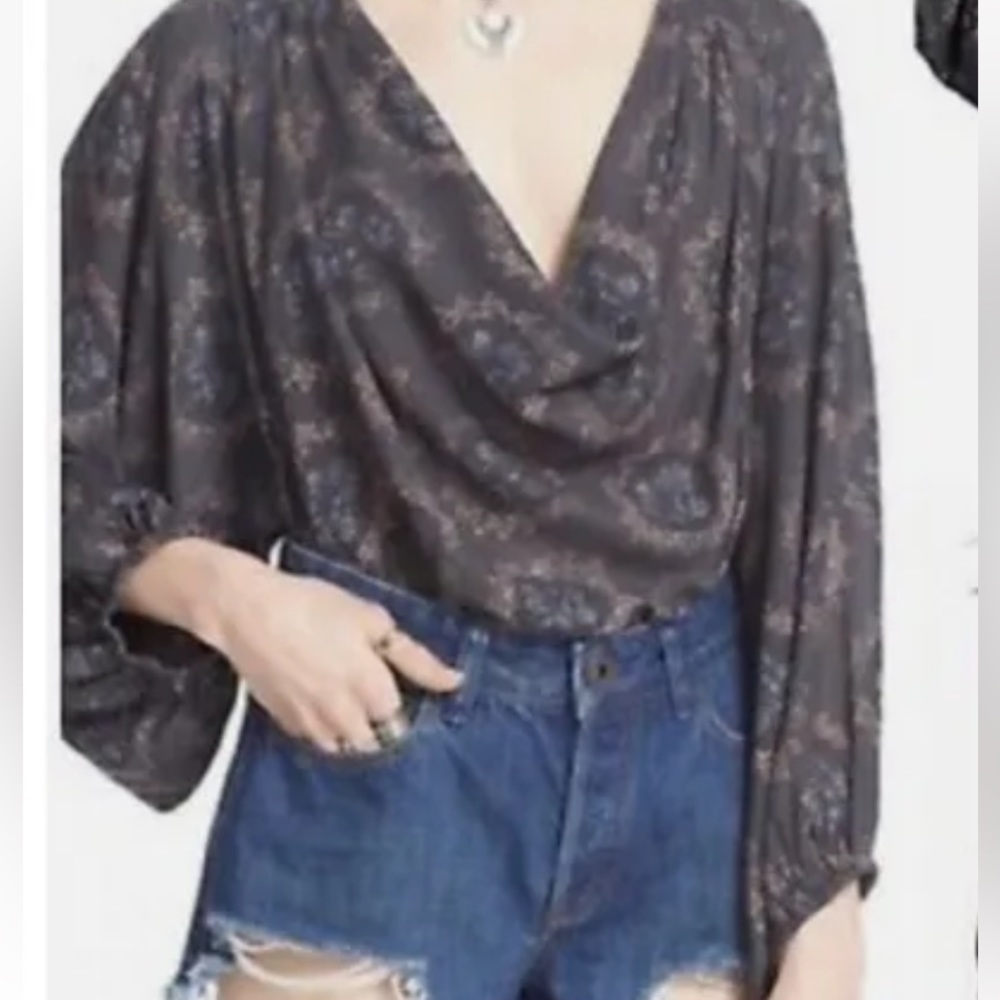 Free people cowling around printed balloon sleeve top. NWOT